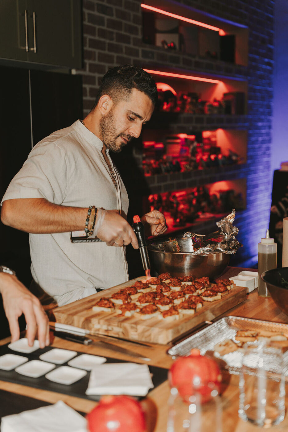 Chef Piaz plating at a live event