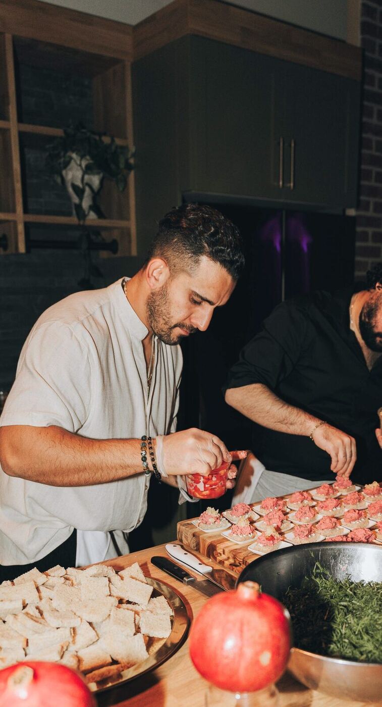 Chef Piaz plating a private dinner
